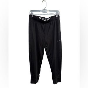 Nike Black Sweatpants with Elastic Waistband and Cuffs